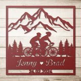 Cycling Couple in the Mountains Metal Wall Art
