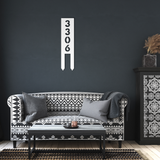 Vertical_House_Number_with_Stakes_White_Dark_Living_Room_Mockup.png
