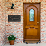 Personalized_Last_Name_with_Date_Metal_W_Black_Brick_Entrance_Mockup.png